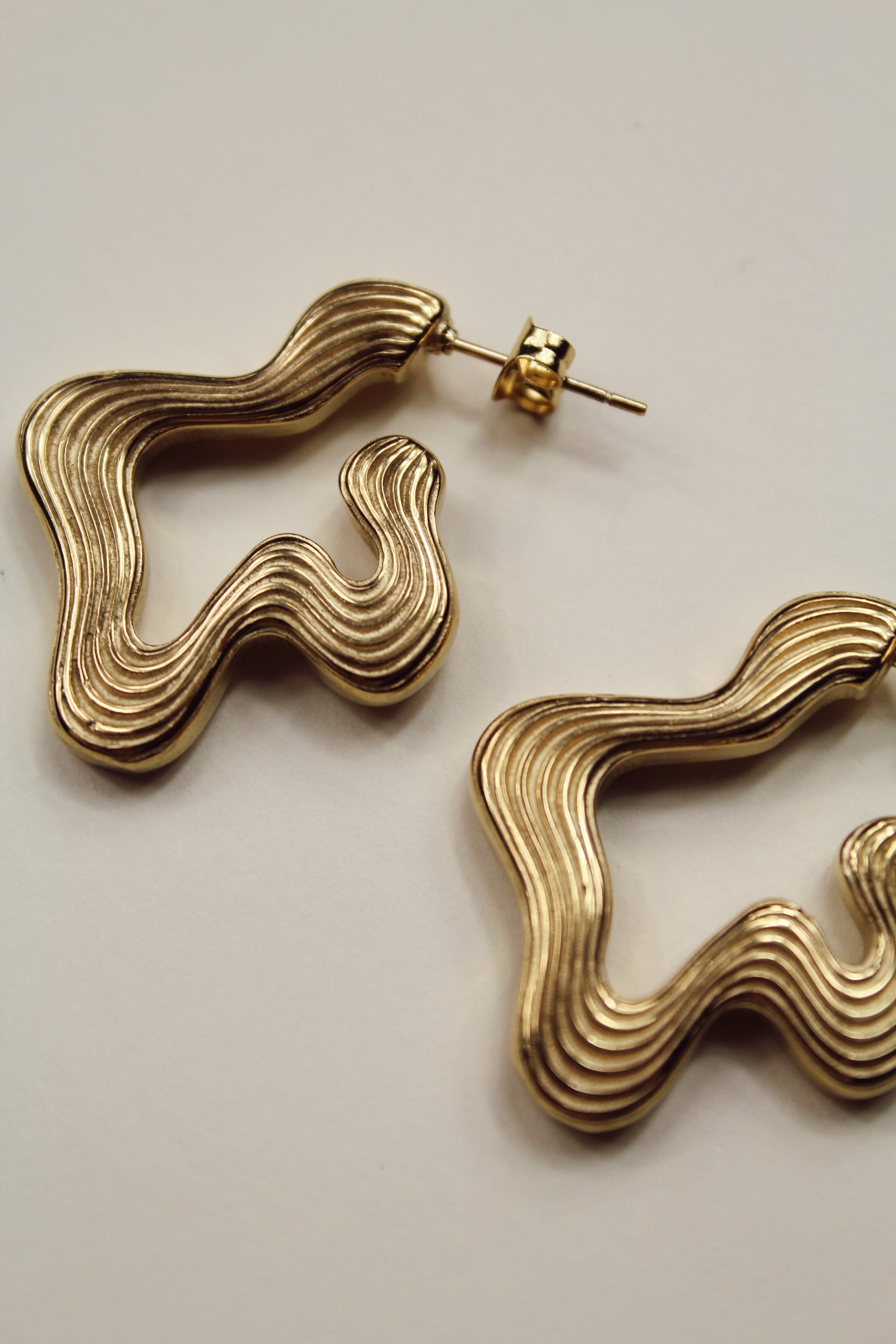 Aretes Dalilo