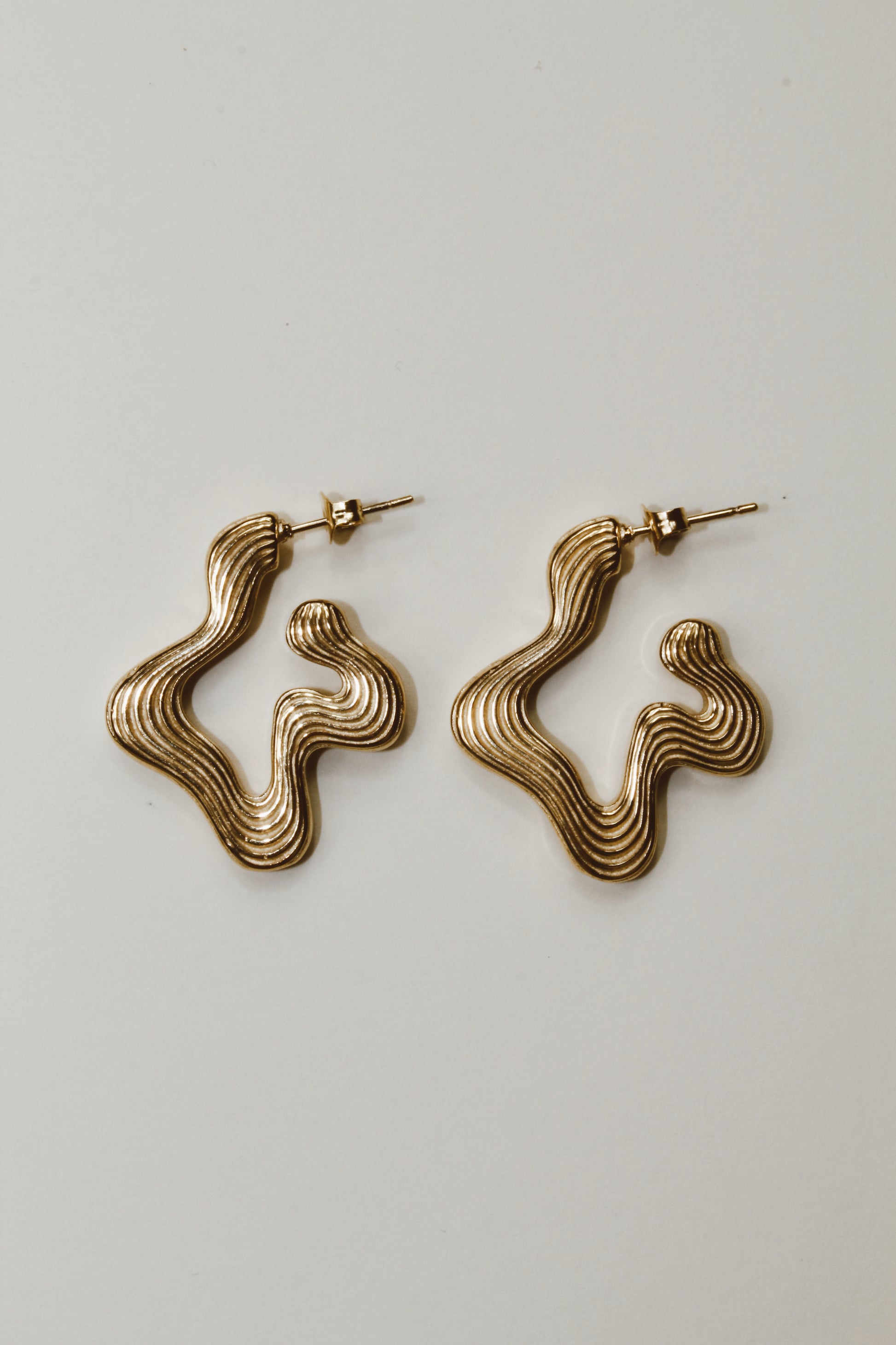 Aretes Dalilo